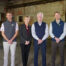 The Clark family standing together for a picture at The Plant.